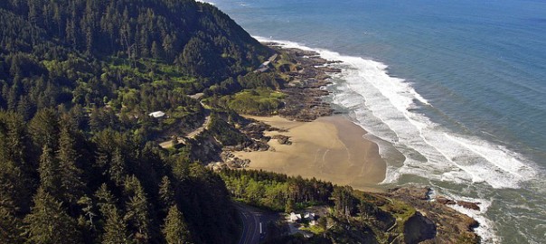 A beach near a mountain